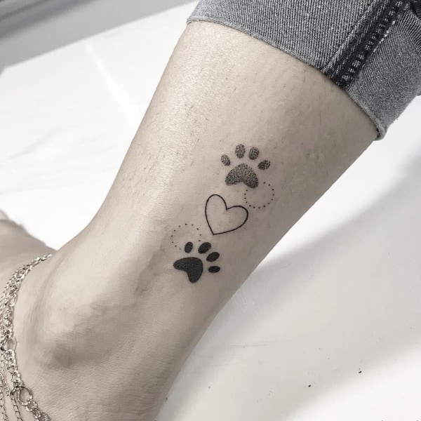 Quanto custa uma Tatuagem feminina de cachorro?